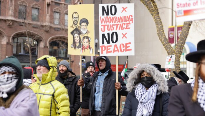 Pro-Palestinian protesters block traffic on Mag Mile to highlight continuing devastation in Gaza