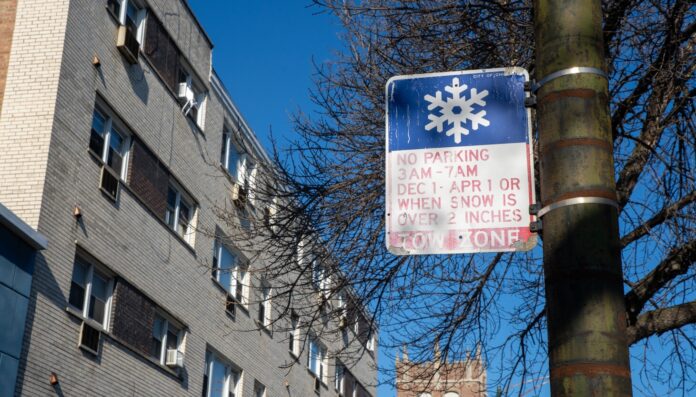 244 cars towed as city begins enforcing overnight parking ban