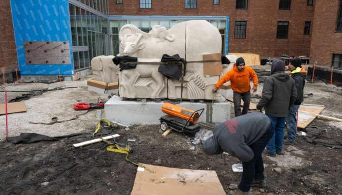 A crack spoils an 85-year-old Edgar Miller sculpture's homecoming. For now, at least.