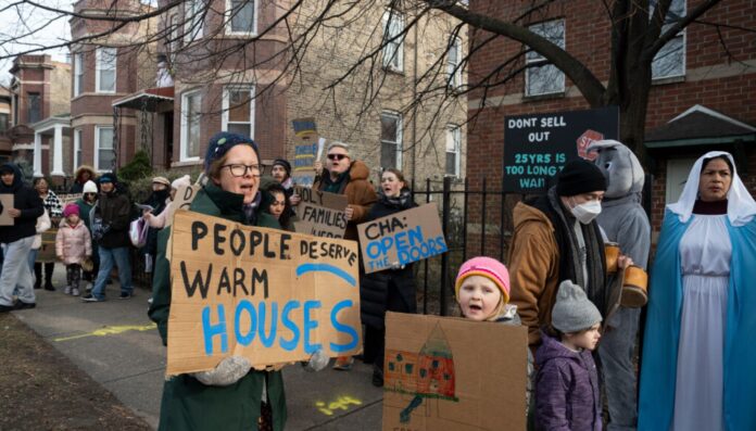 Advocates, residents demand action on vacant CHA properties during Las Posadas rally in Logan Square