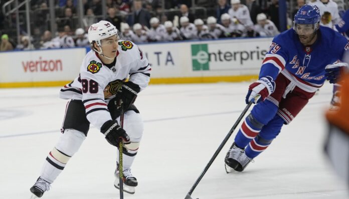 Blackhawks trying to get Connor Bedard the puck in motion more often