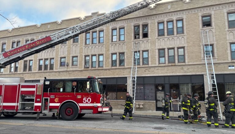 Firefighters rescue occupant of Auburn Gresham building during blaze that also injured child