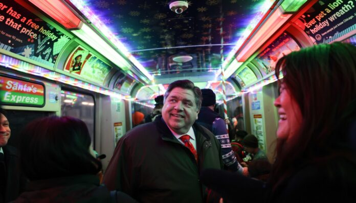 Scenes from JB Pritzker aboard the CTA holiday train