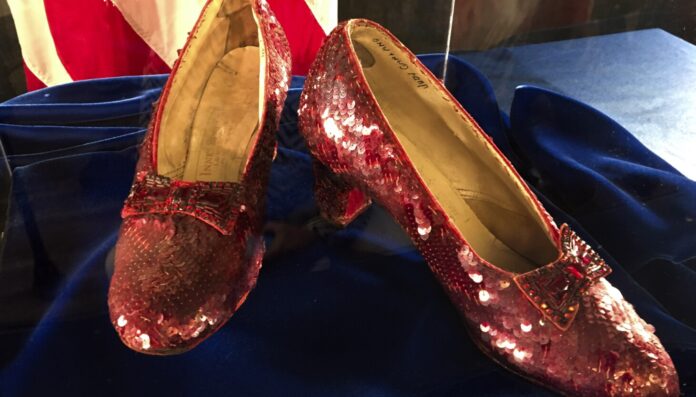 Stolen ruby slippers worn by Judy Garland in 'The Wizard of Oz' are auctioned for $28 million