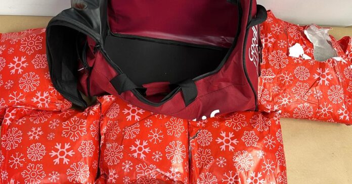 Woman arrested for allegedly trying to smuggle meth, disguised as Christmas presents, in carry-on bag